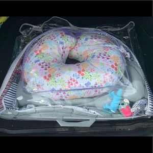 Baby play Matt with pillow